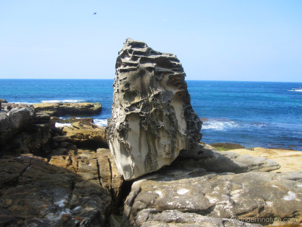 Rock formations adorn the walk